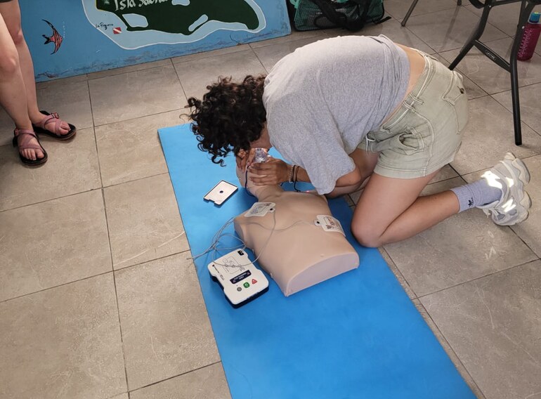 Emergency First Response CPR practice included with the Rescue Diver course
